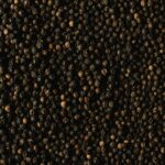 Detailed close-up of black peppercorns showcasing texture and spice quality.